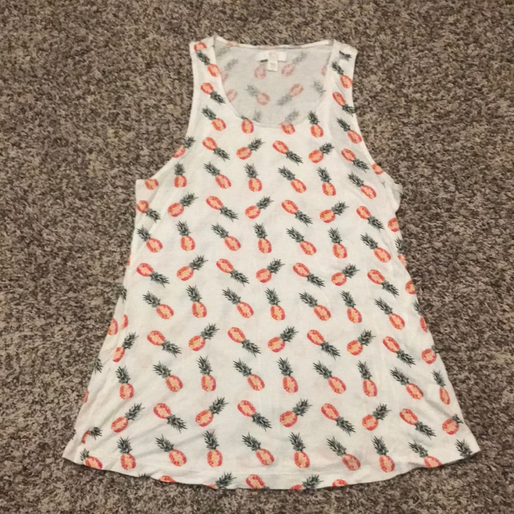 Two tank tops. Both fit like XS